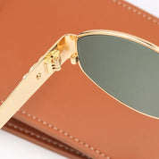 Todelle | Chic Oval Frame Sunglasses | Gold & Black | Durable Metal & Polycarbonate | Your Fashionable Shield Against the Sun