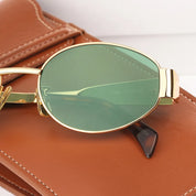 Todelle | Chic Oval Frame Sunglasses | Gold & Black | Durable Metal & Polycarbonate | Your Fashionable Shield Against the Sun